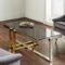 Nexus Gold and Silver Coffee Table in Modern Living Room Setting