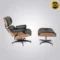 Eames lounge chair replica with normal base and matching ottoman in black ash wood.