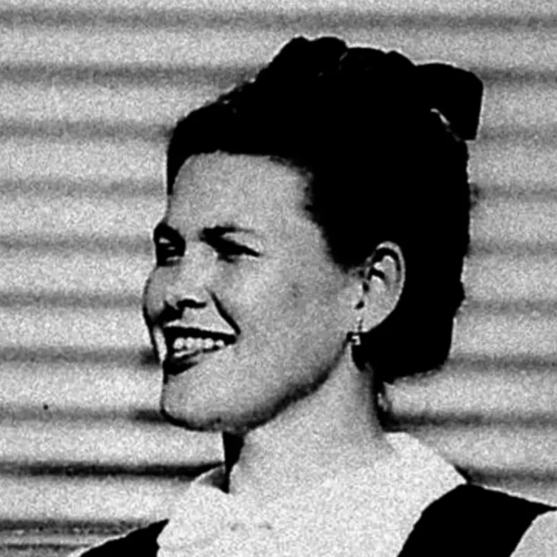 Charles and Ray Eames collaborating in design studio creating modern furniture